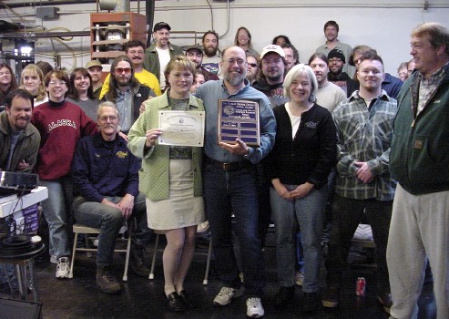 Labor Dep. Commissioner Rebecca Nance Gamez presents SHARP award to employees of Alaskan Brewing Company